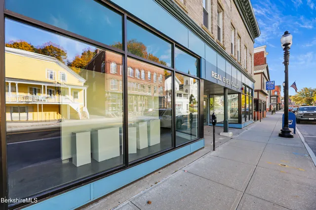 a view of a building with a street