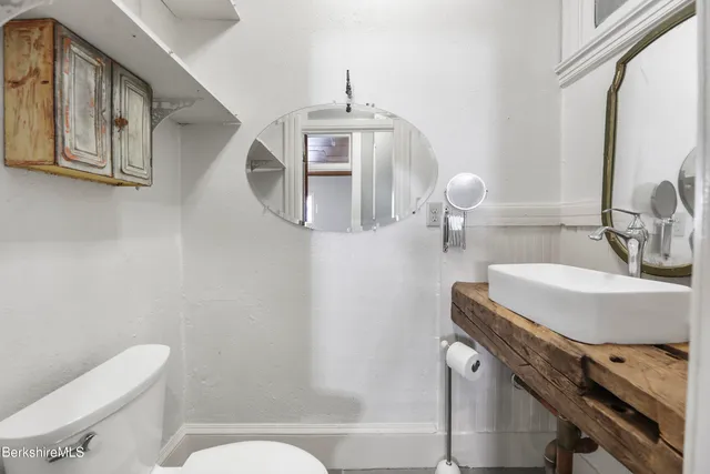 a kitchen with a stove and a fireplace