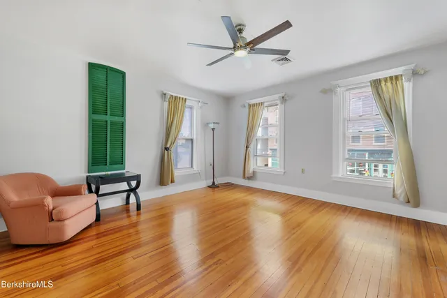 a view of livingroom with furniture and wooden floor