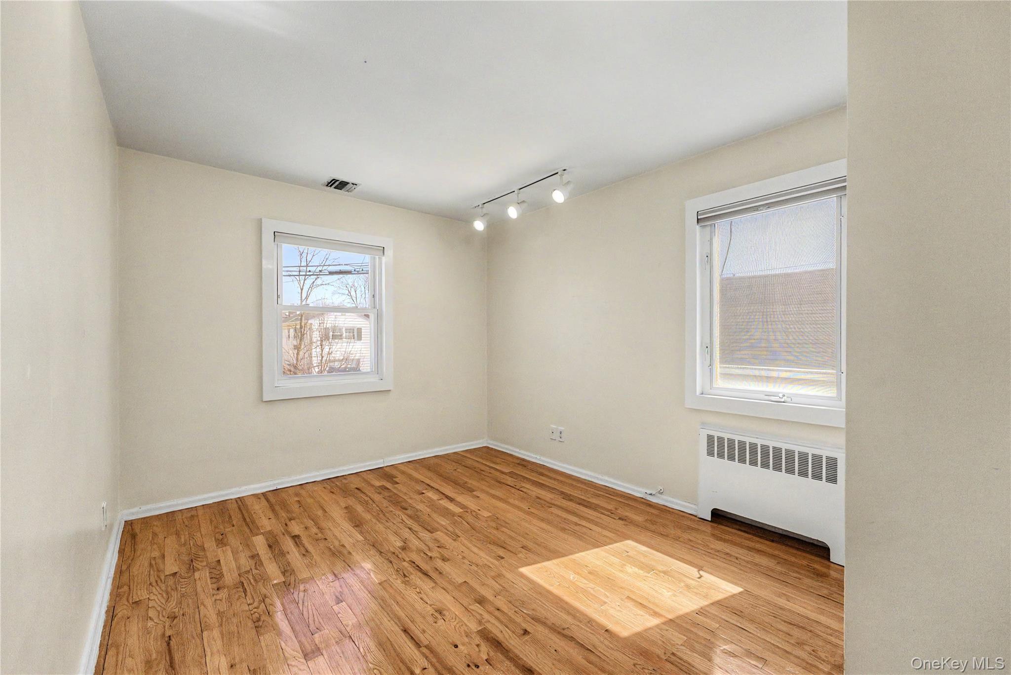 567 Oxford Road Cedarhurst, NY 11516 - Photo 16 of 31 a view of a livingroom with a window