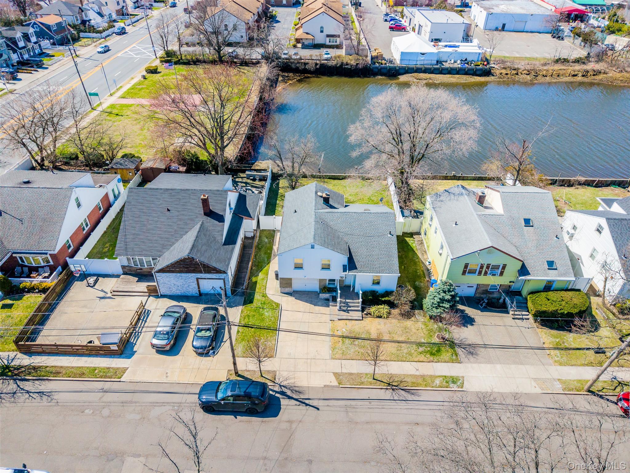 567 Oxford Road Cedarhurst, NY 11516 - Photo 26 of 31 an aerial view of residential houses with outdoor space