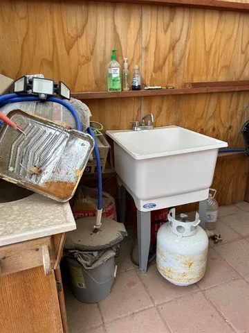 a bathroom with a toilet and a bathtub
