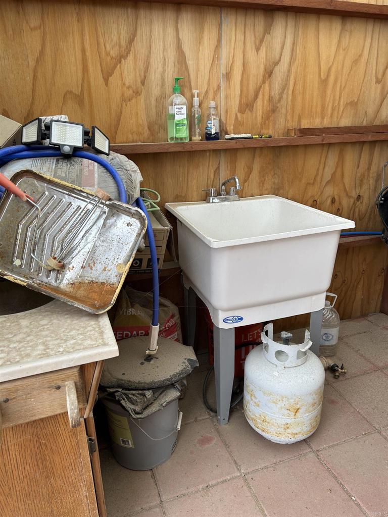 920 Joshua Road El Centro, CA 92243 - Photo 5 of 9 a room with a sink and a microwave