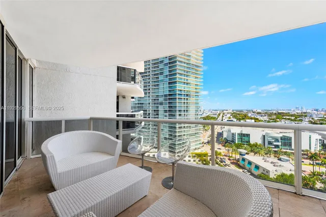 a view of a living room and dining room