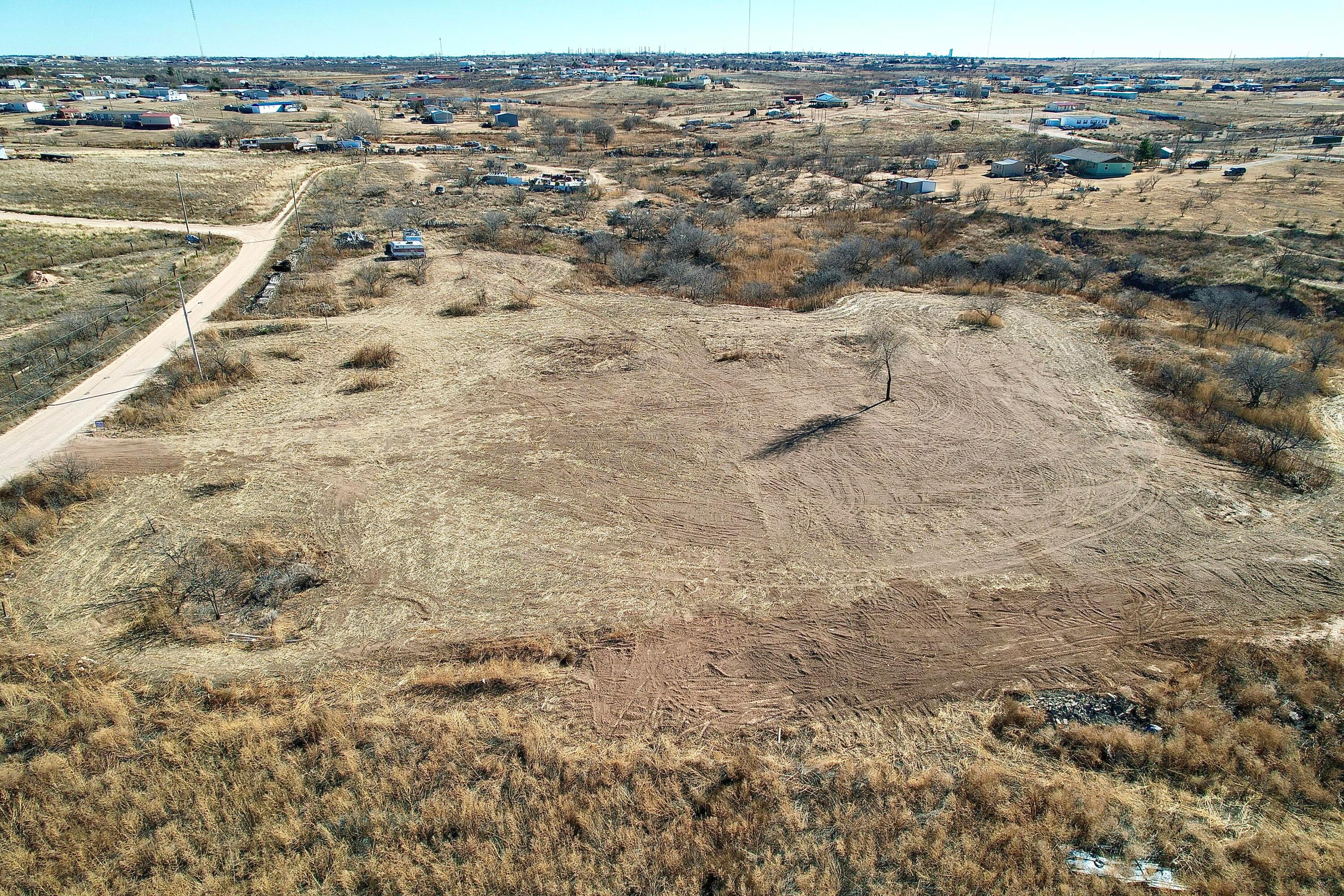 1911 Nez Perce Trail Amarillo, TX 79108 - Photo 6 of 10 an aerial view of residential houses with outdoor space