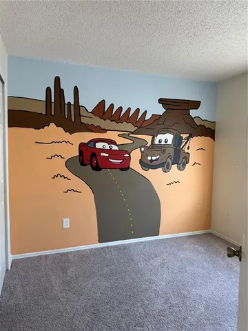 a view of a room with air conditioner duct