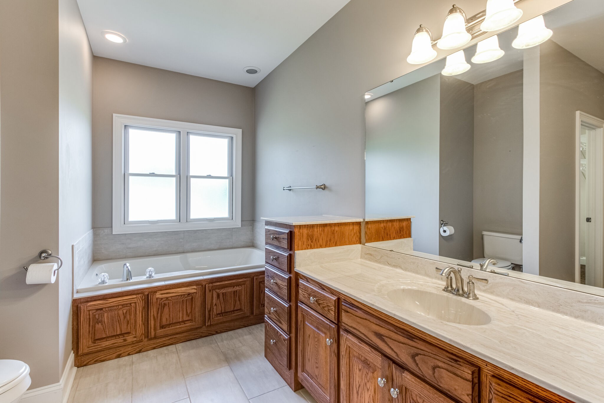 1169 Shedd Road Manchester, TN 37355 - Photo 16 of 36 a bathroom with a sink and a bathtub