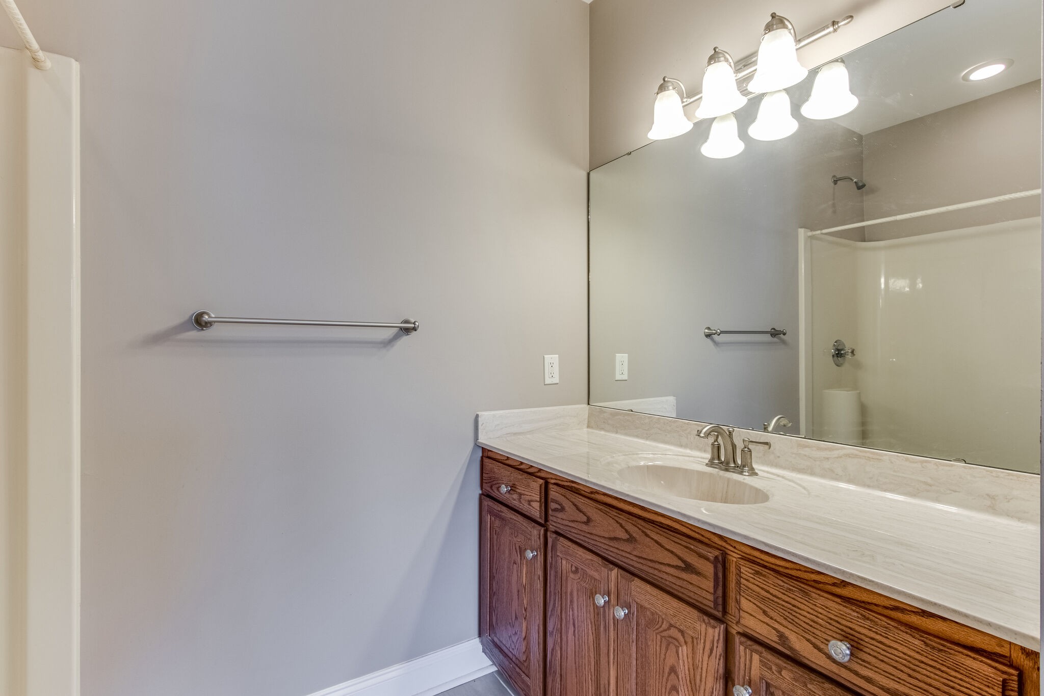 1169 Shedd Road Manchester, TN 37355 - Photo 17 of 36 a bathroom with a sink a light fixture and a mirror