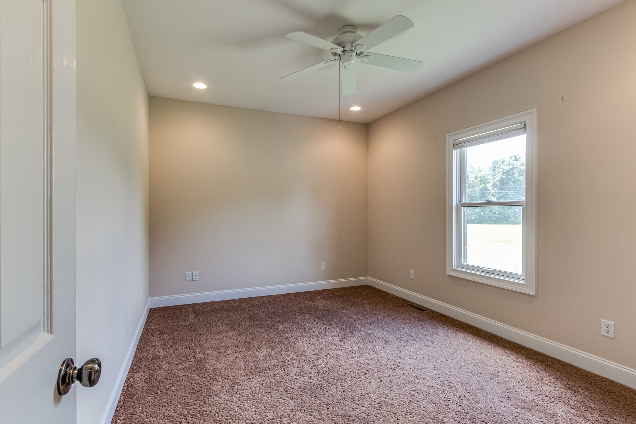 1169 Shedd Road Manchester, TN 37355 - Photo 20 of 36 wooden floor in an empty room with a window