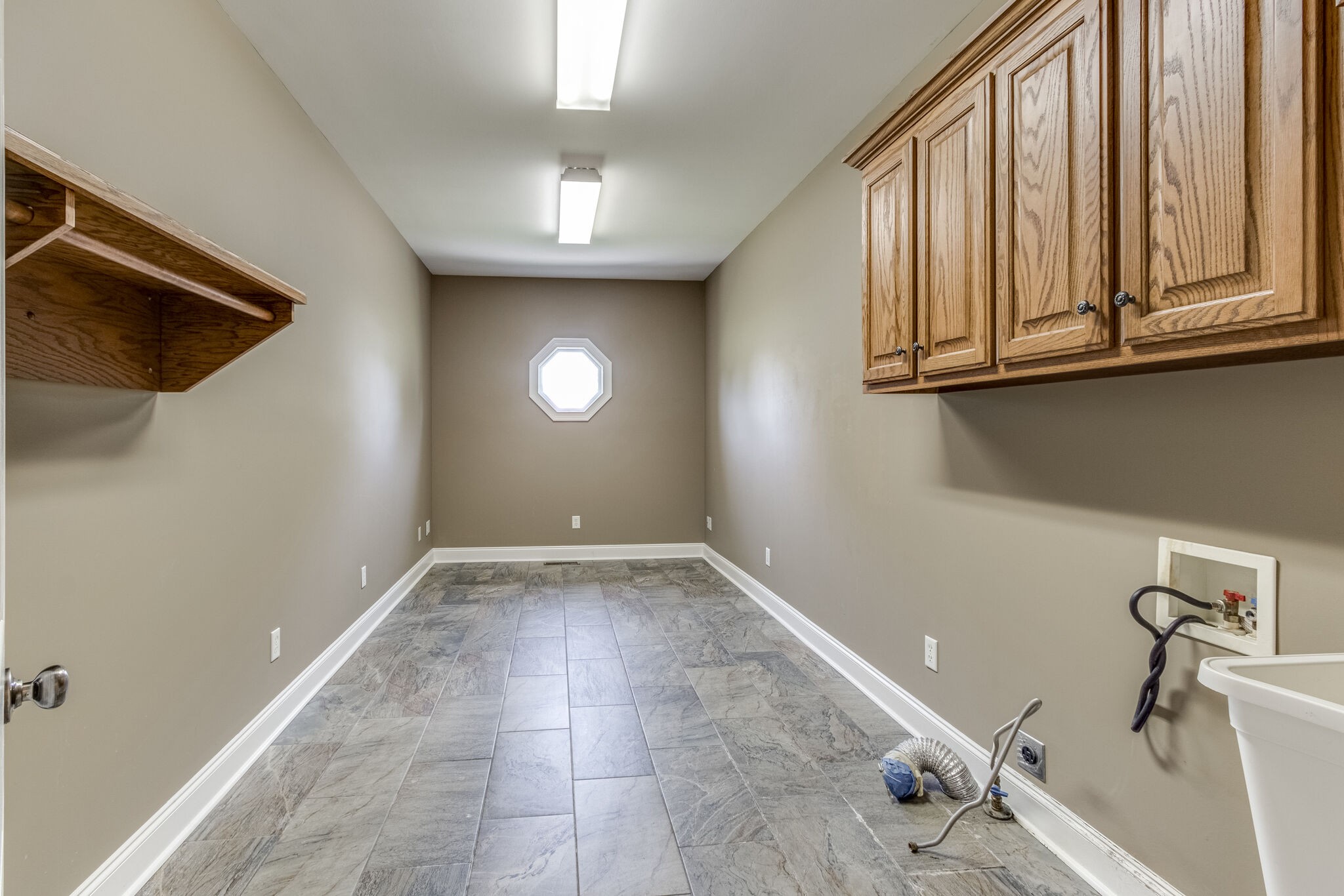 1169 Shedd Road Manchester, TN 37355 - Photo 22 of 36 a view of a livingroom with wooden floor and staircase