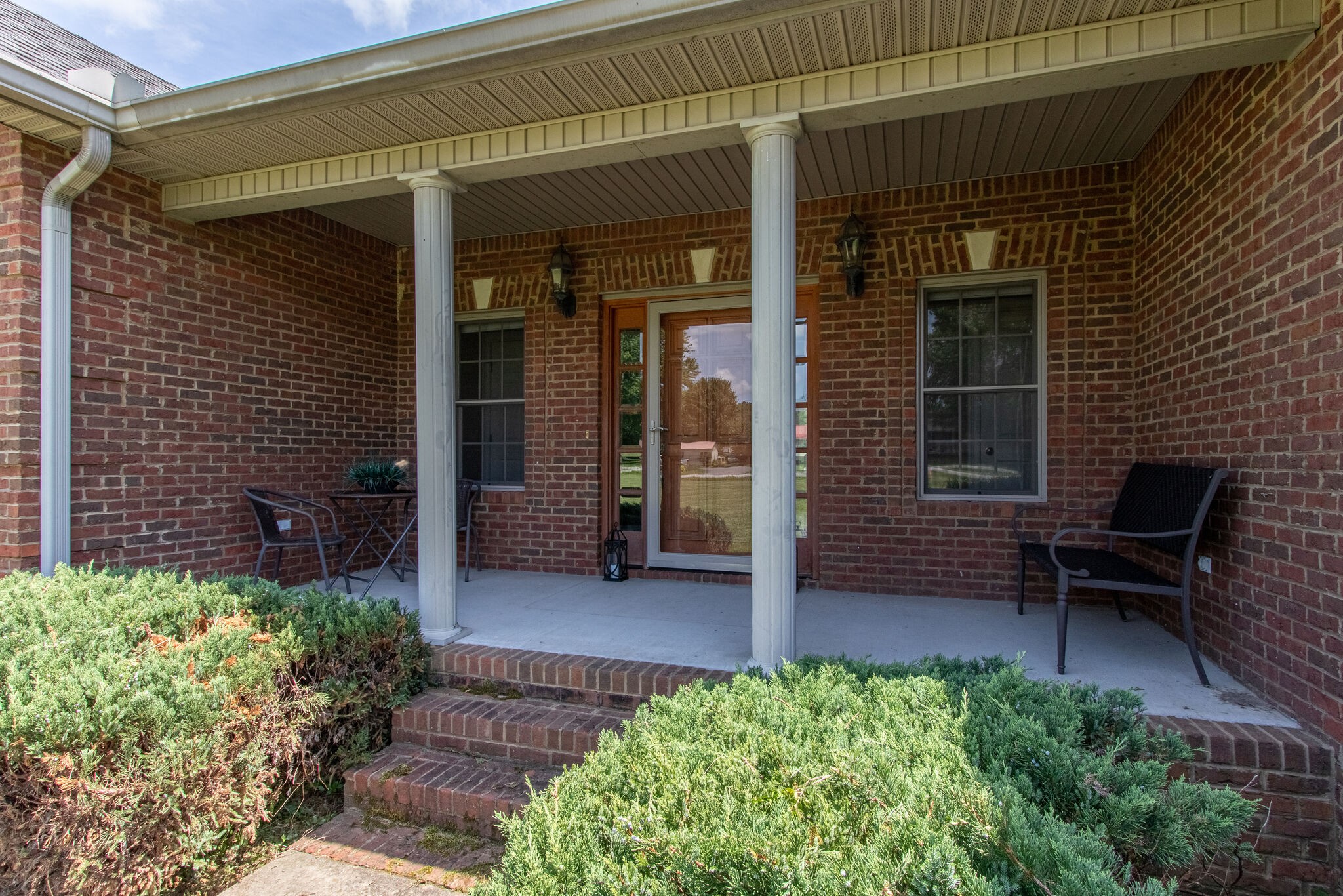 1169 Shedd Road Manchester, TN 37355 - Photo 4 of 36 a view of front door and outdoor seating