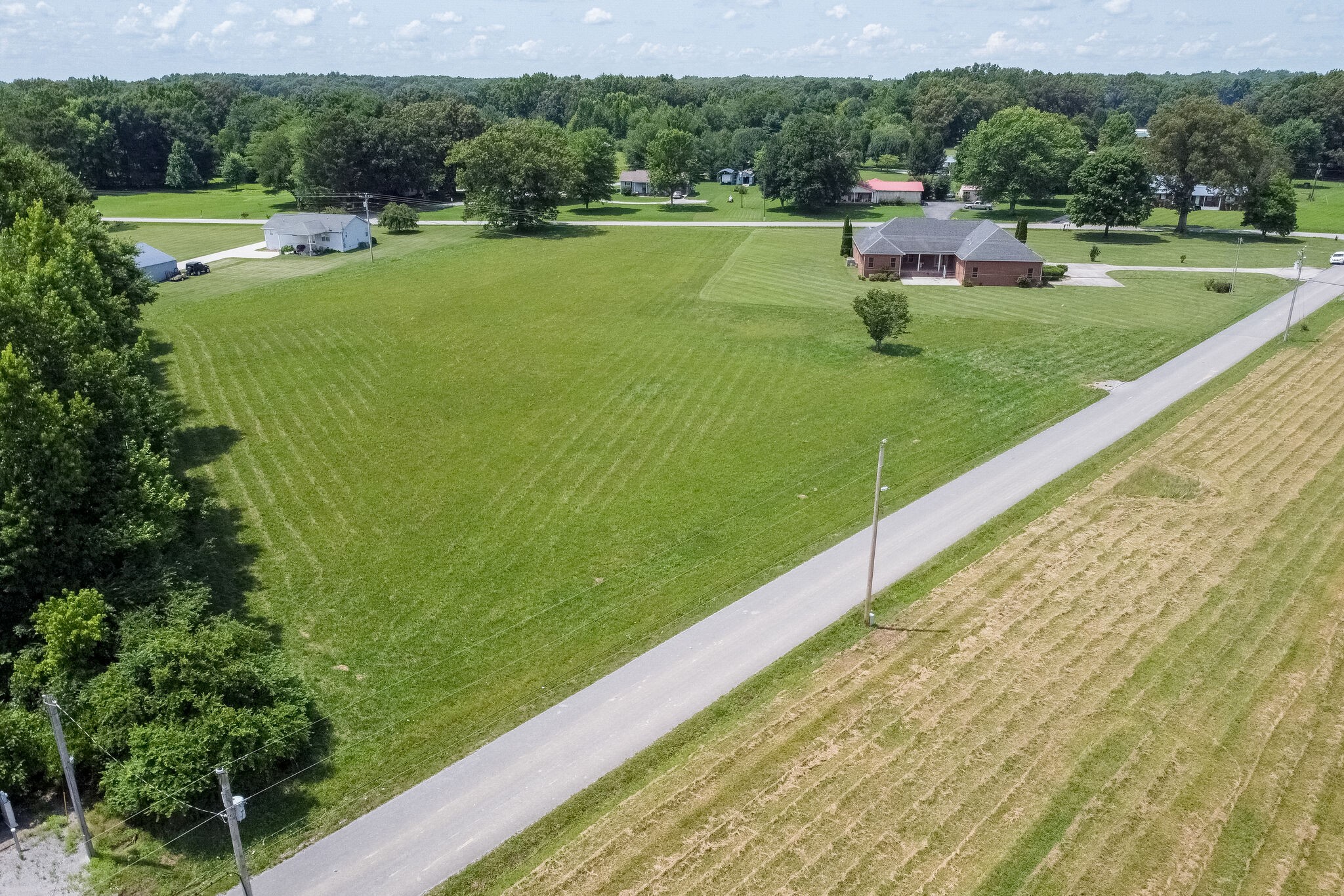 1169 Shedd Road Manchester, TN 37355 - Photo 33 of 36 a view of a lake with a big yard