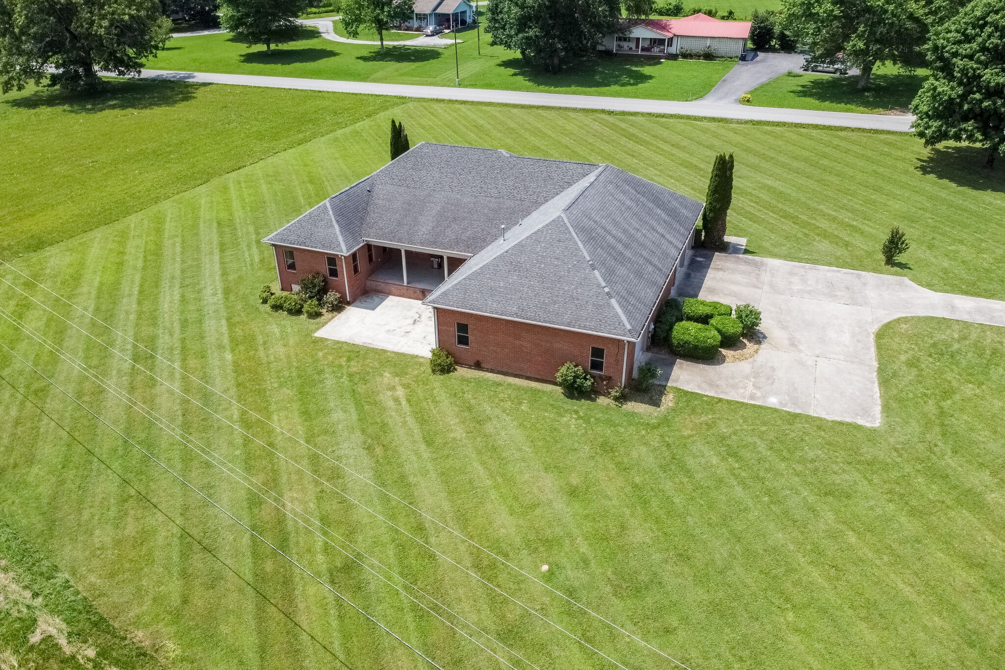 1169 Shedd Road Manchester, TN 37355 - Photo 34 of 36 a view of a house with a big yard