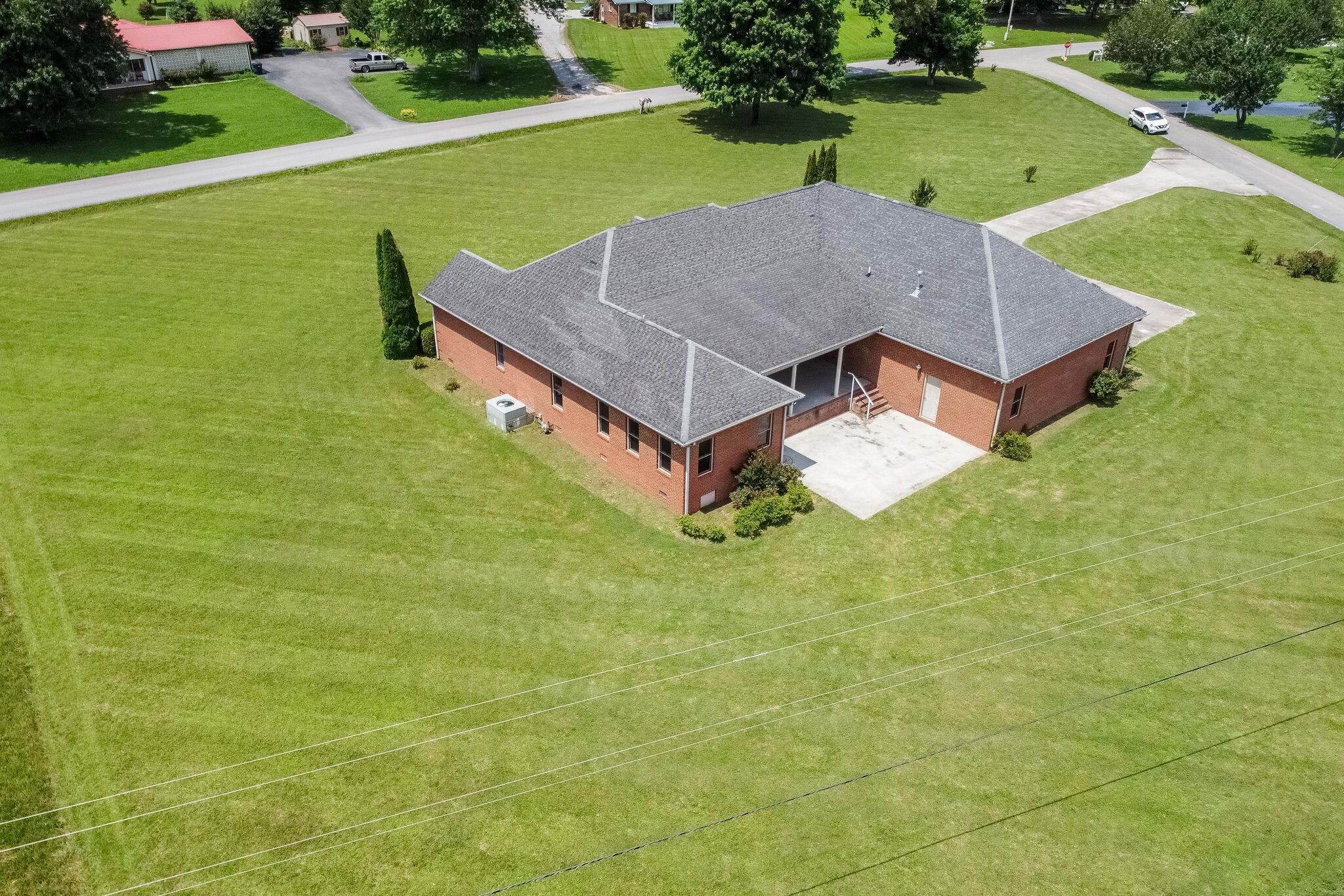 1169 Shedd Road Manchester, TN 37355 - Photo 35 of 36 a aerial view of a house with swimming pool garden and big yard
