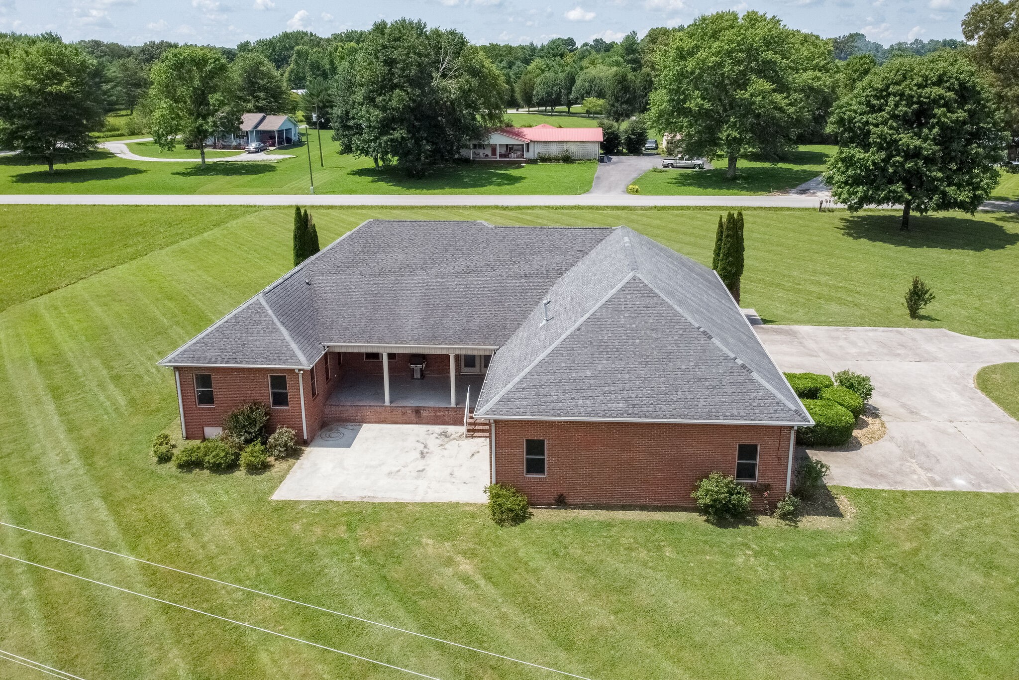 1169 Shedd Road Manchester, TN 37355 - Photo 36 of 36 a aerial view of a house with a yard and a patio