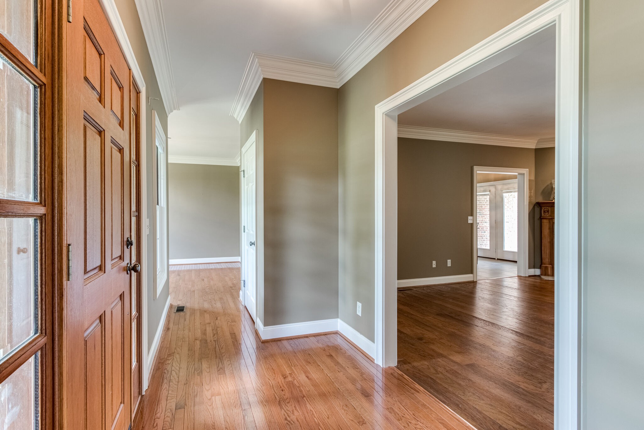 1169 Shedd Road Manchester, TN 37355 - Photo 5 of 36 a view of a hallway with wooden floor and staircase