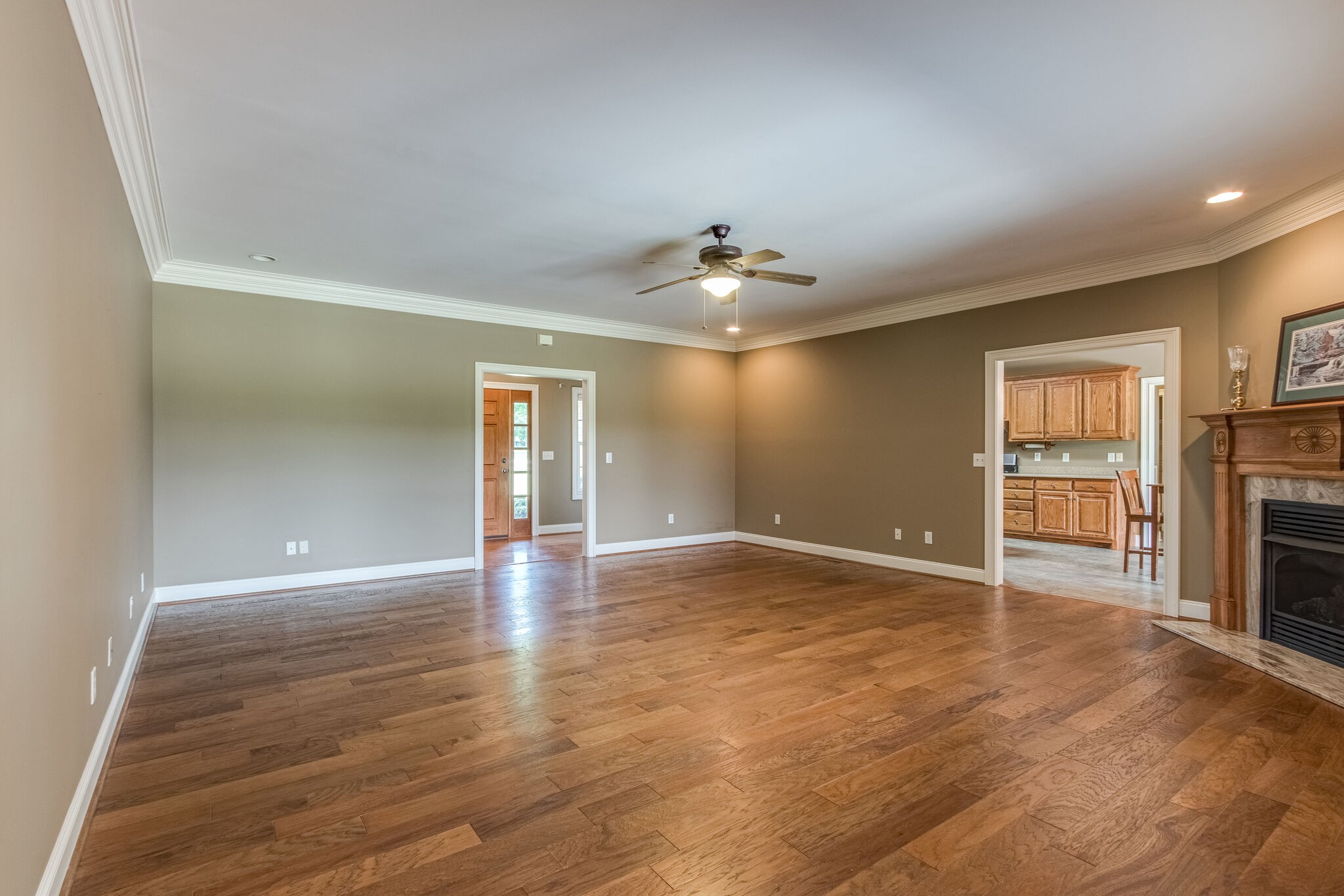 1169 Shedd Road Manchester, TN 37355 - Photo 7 of 36 a view of an empty room with a fireplace and a window