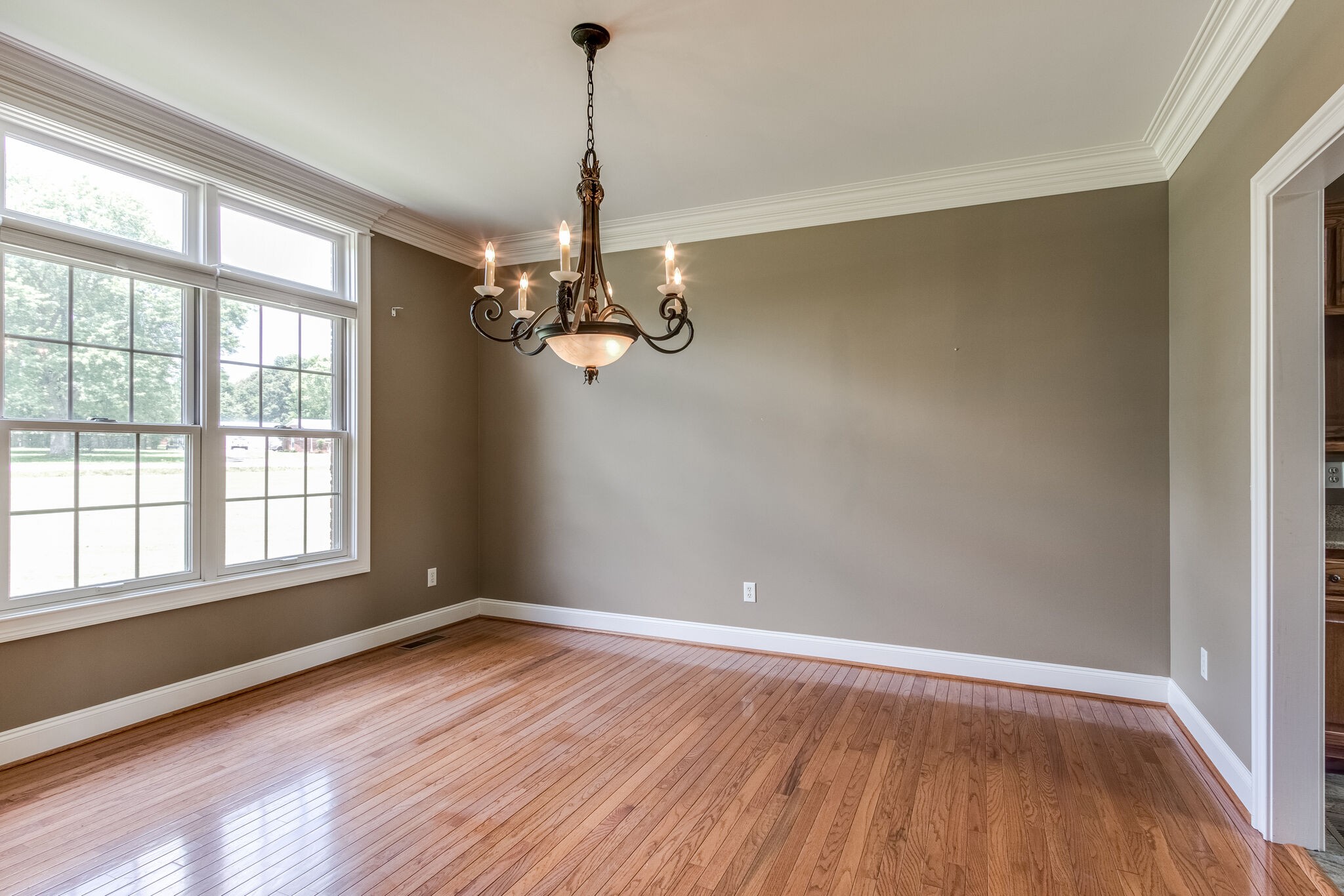 1169 Shedd Road Manchester, TN 37355 - Photo 8 of 36 wooden floor in an empty room with a window