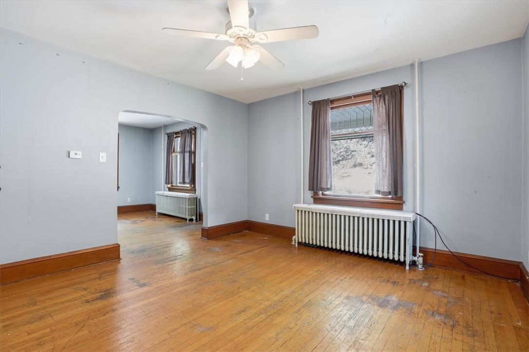 167 Main Road Lehighton, PA 18235 - Photo 11 of 41 Hardwood floors and a ceiling fan create a comfortable atmosphere in this open living space.