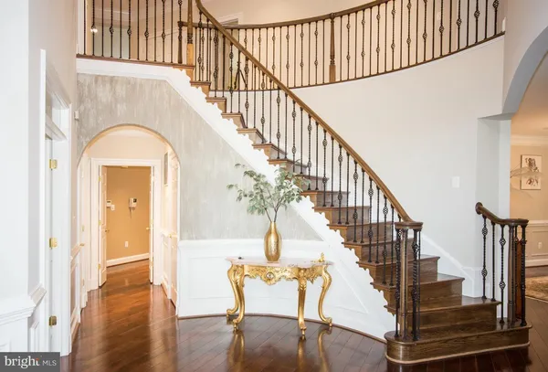 a view of entryway with wooden floor