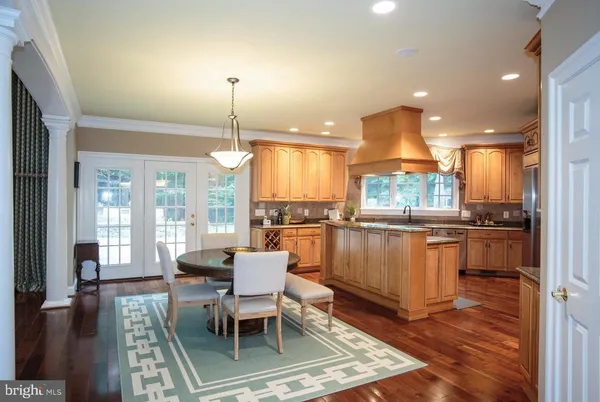 a view of a livingroom with furniture and a table