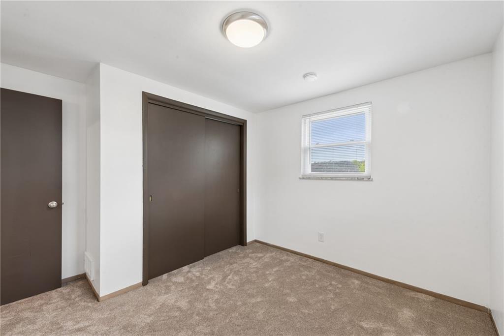 403 Homewood Avenue Trafford, PA 15085 - Photo 11 of 30 an empty room with windows