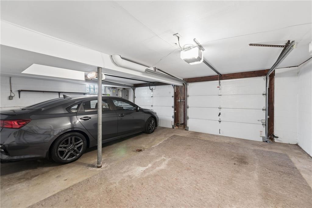 403 Homewood Avenue Trafford, PA 15085 - Photo 24 of 30 a view of a garage and car parked