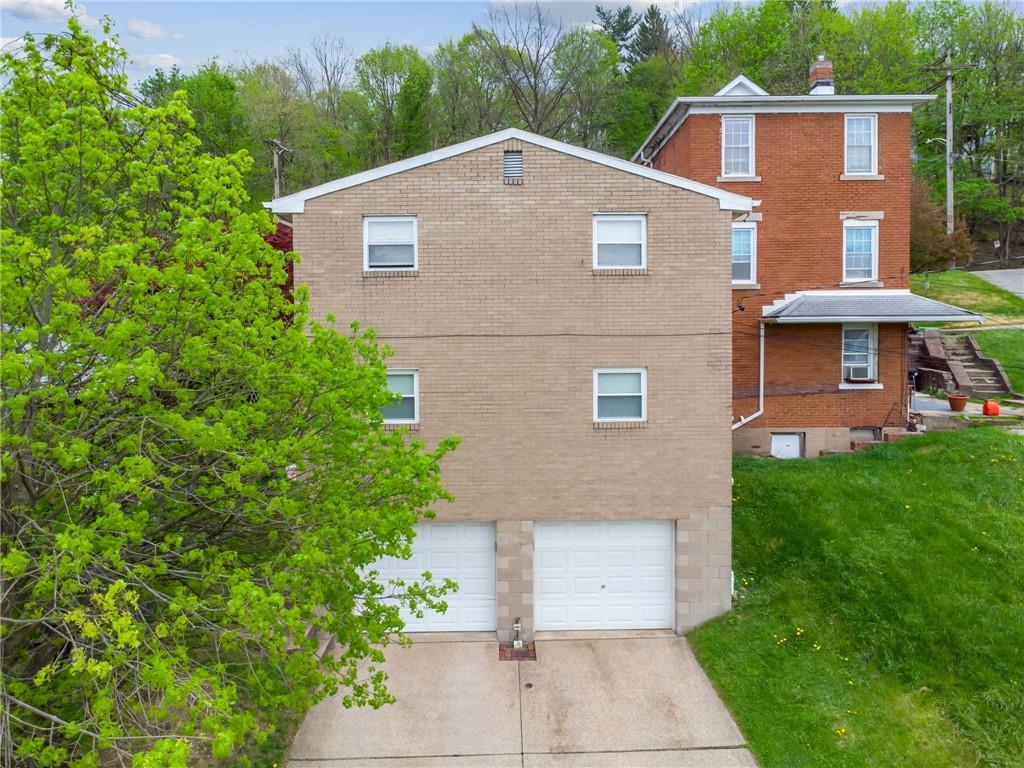 403 Homewood Avenue Trafford, PA 15085 - Photo 25 of 30 a aerial view of a house with yard and sitting area