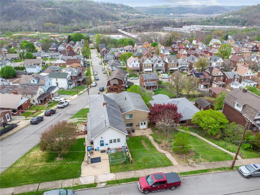 403 Homewood Avenue Trafford, PA 15085 - Photo 29 of 30 an aerial view of a city with lots of residential buildings ocean and mountain view in back
