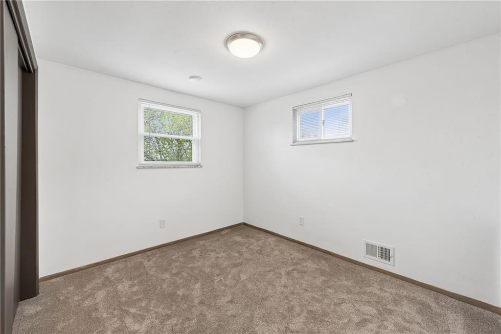 403 Homewood Avenue Trafford, PA 15085 - Photo 10 of 30 an empty room with a window