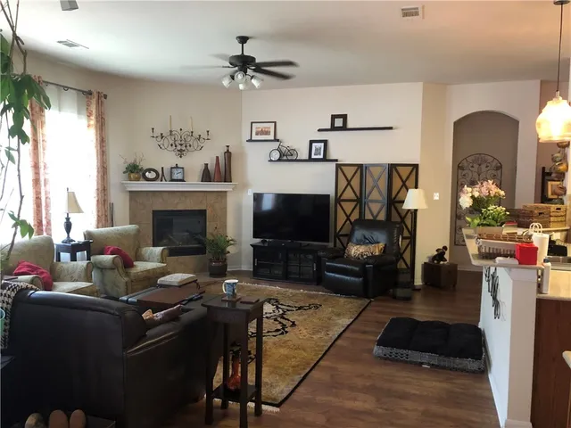 a view of a roof deck with furniture