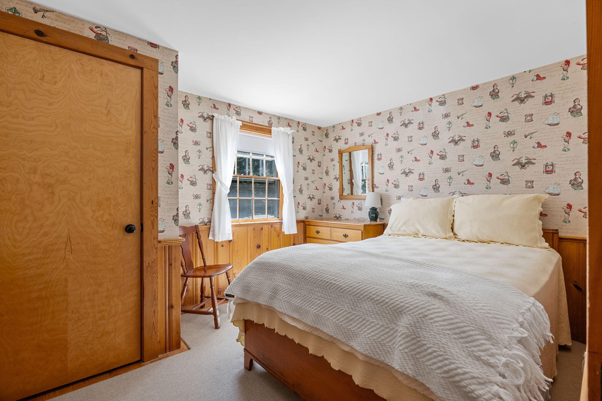 141 Marsh View Road Chatham, MA 02633 - Photo 12 of 24 a bedroom with a bed and a window with bathroom