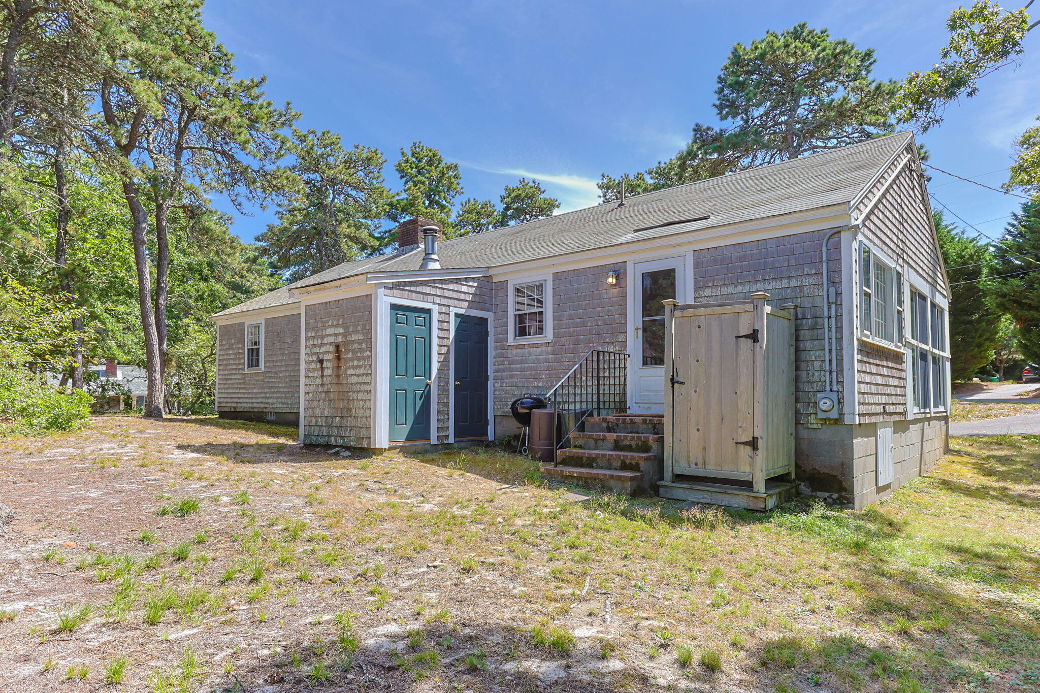 141 Marsh View Road Chatham, MA 02633 - Photo 19 of 24 a view of a house with a yard