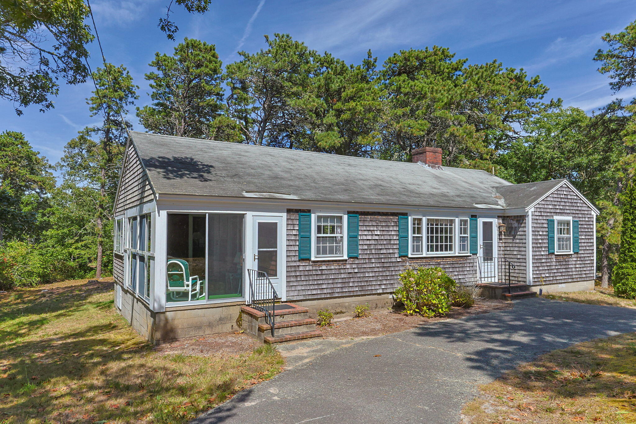 141 Marsh View Road Chatham, MA 02633 - Photo 2 of 24 front view of a house with a outdoor space