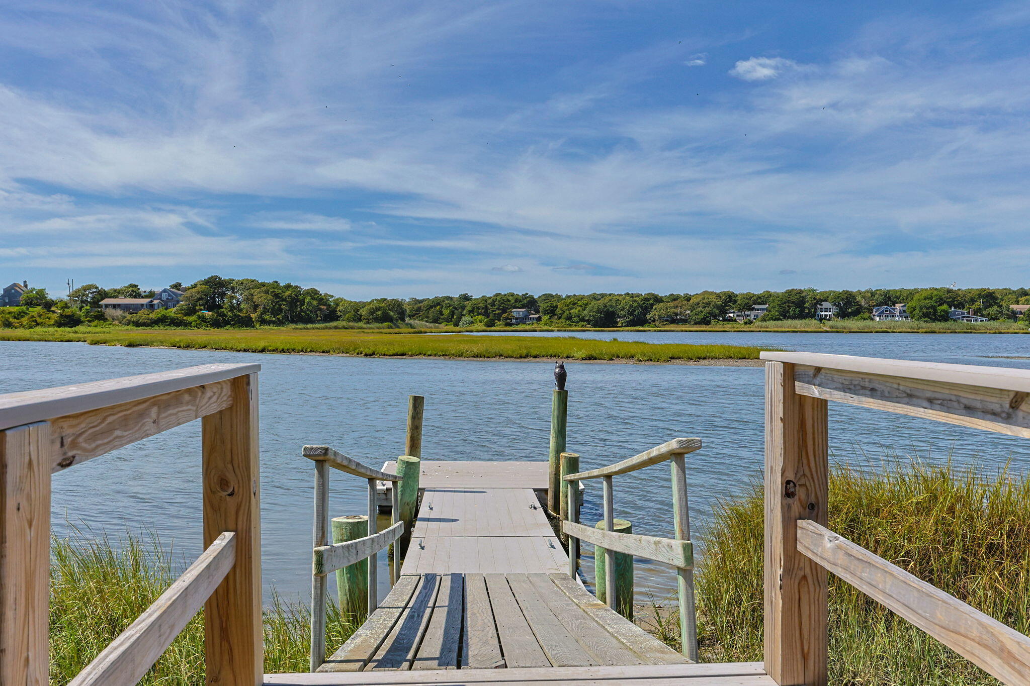 141 Marsh View Road Chatham, MA 02633 - Photo 22 of 24 a view of a terrace with a lake view