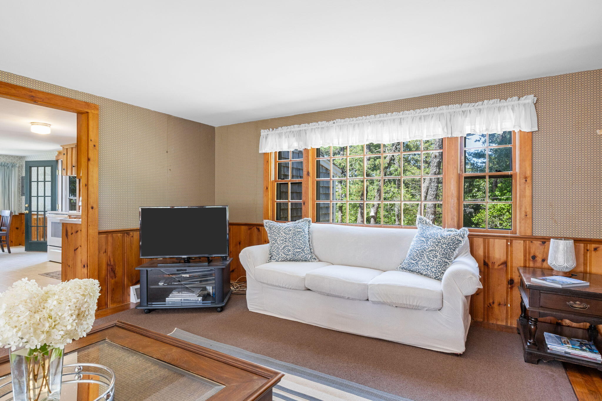 141 Marsh View Road Chatham, MA 02633 - Photo 6 of 24 a living room with furniture and a flat screen tv
