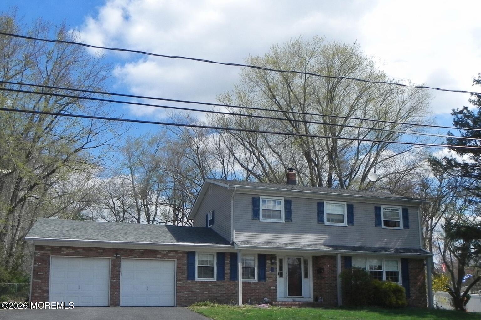 4 Westbrook Road Howell, NJ 07731 - Photo 1 of 18 a view of a building with a tree