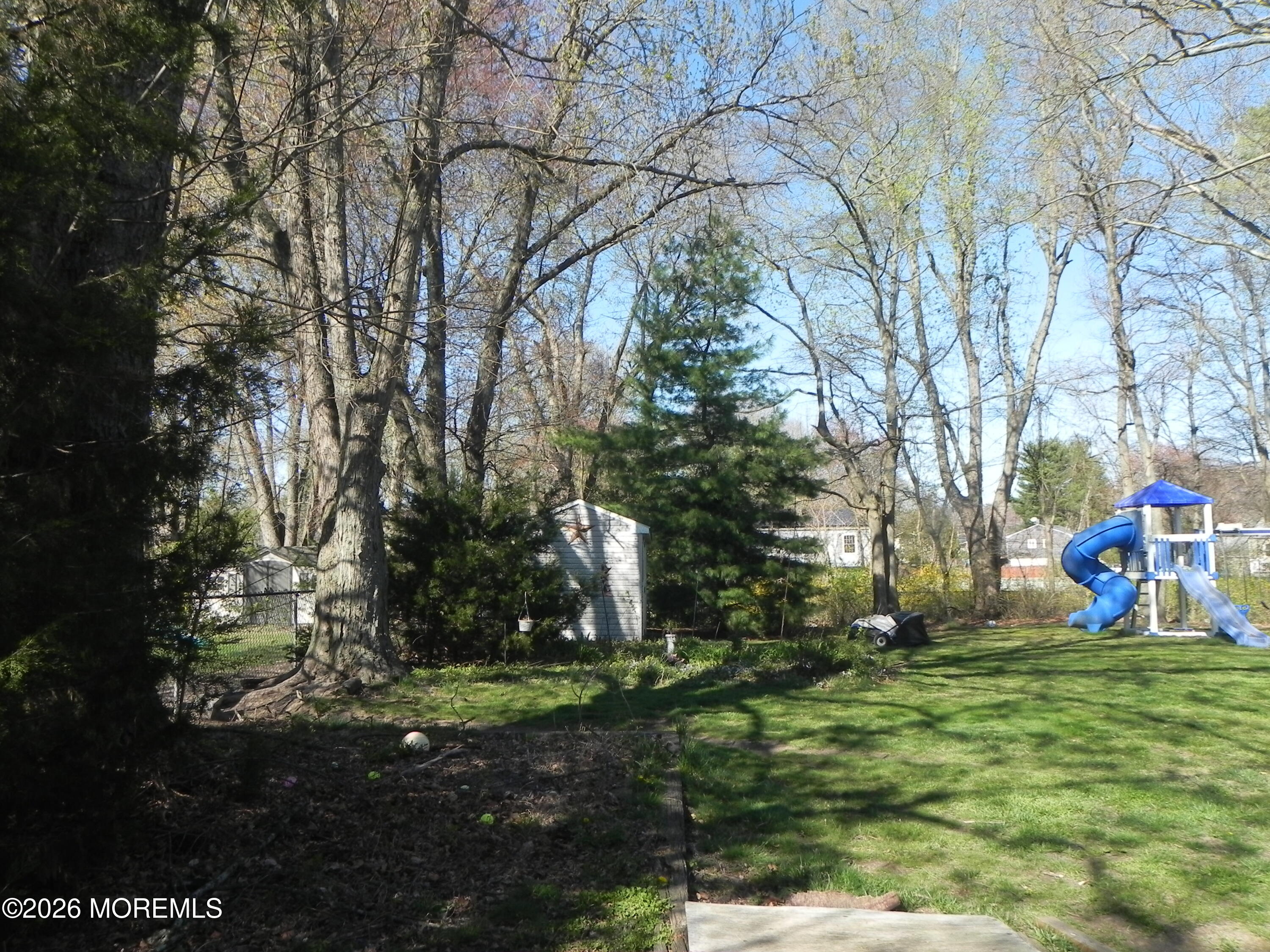 4 Westbrook Road Howell, NJ 07731 - Photo 16 of 18 a view of outdoor space with garden and trees