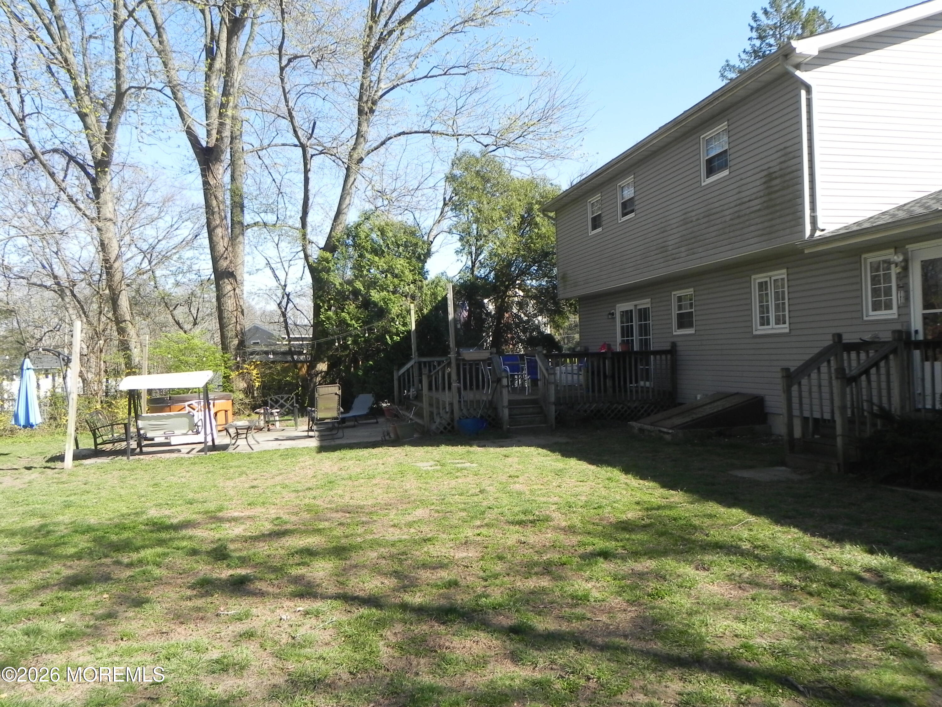 4 Westbrook Road Howell, NJ 07731 - Photo 17 of 18 a swimming pool with outdoor seating and yard