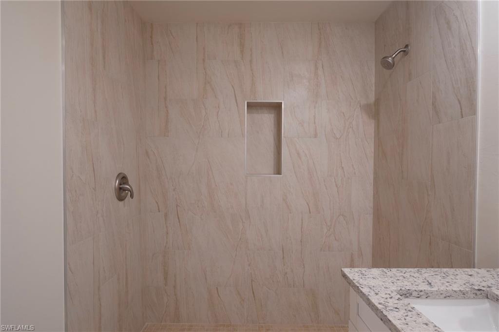 2120 French Street Fort Myers, FL 33916 - Photo 13 of 20 a bathroom with a shower curtain and a sink