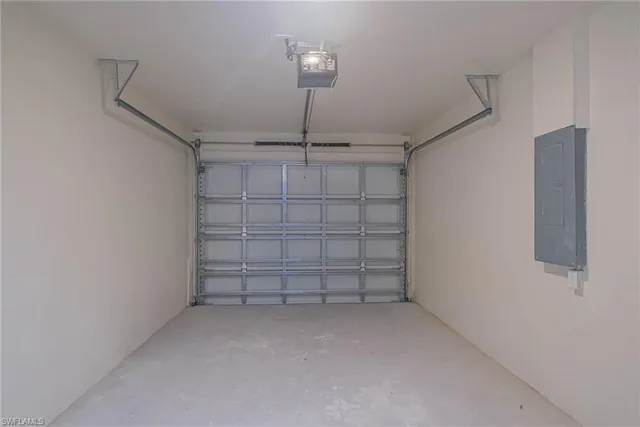 a view of a store room cabinets and empty racks