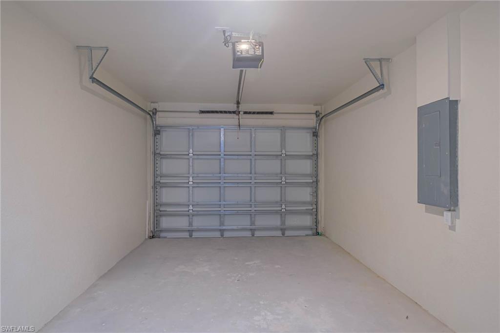 2120 French Street Fort Myers, FL 33916 - Photo 5 of 20 a view of a store room cabinets and empty racks