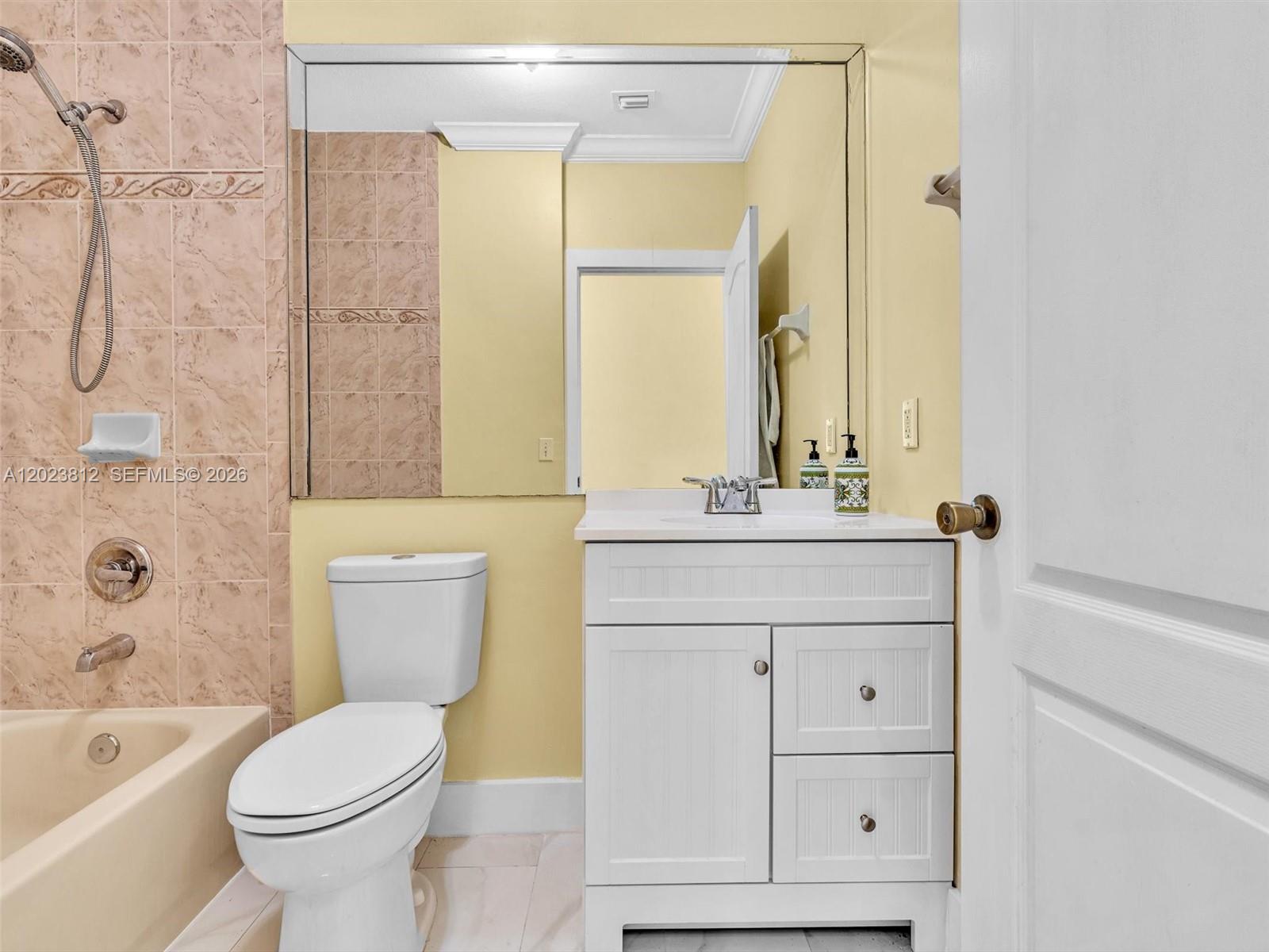 2864 Southwest 138th Path Miami, FL 33175 - Photo 27 of 40 a bathroom with a sink a toilet and shower