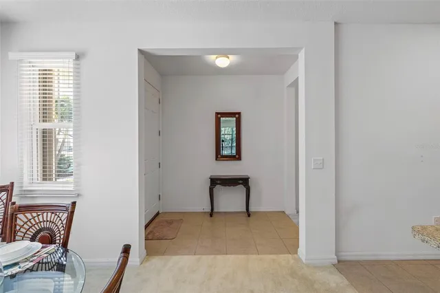 a kitchen with a stove a sink and a refrigerator