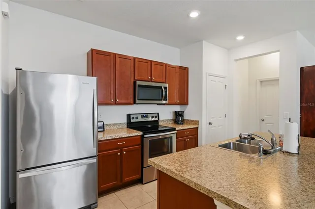 a very nice looking dining room with a table and chairs