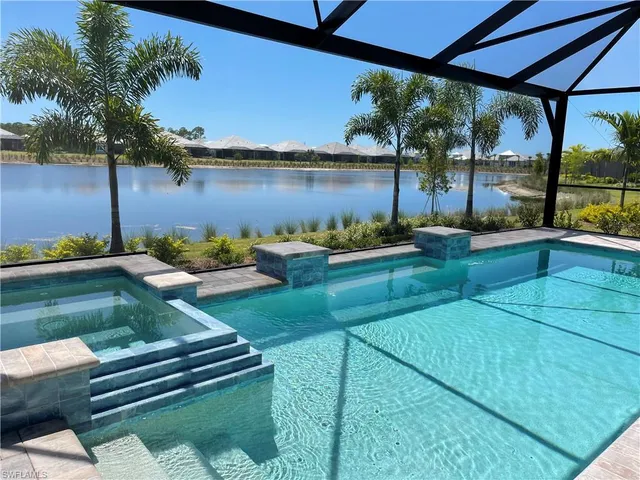 a view of a garden with sitting area