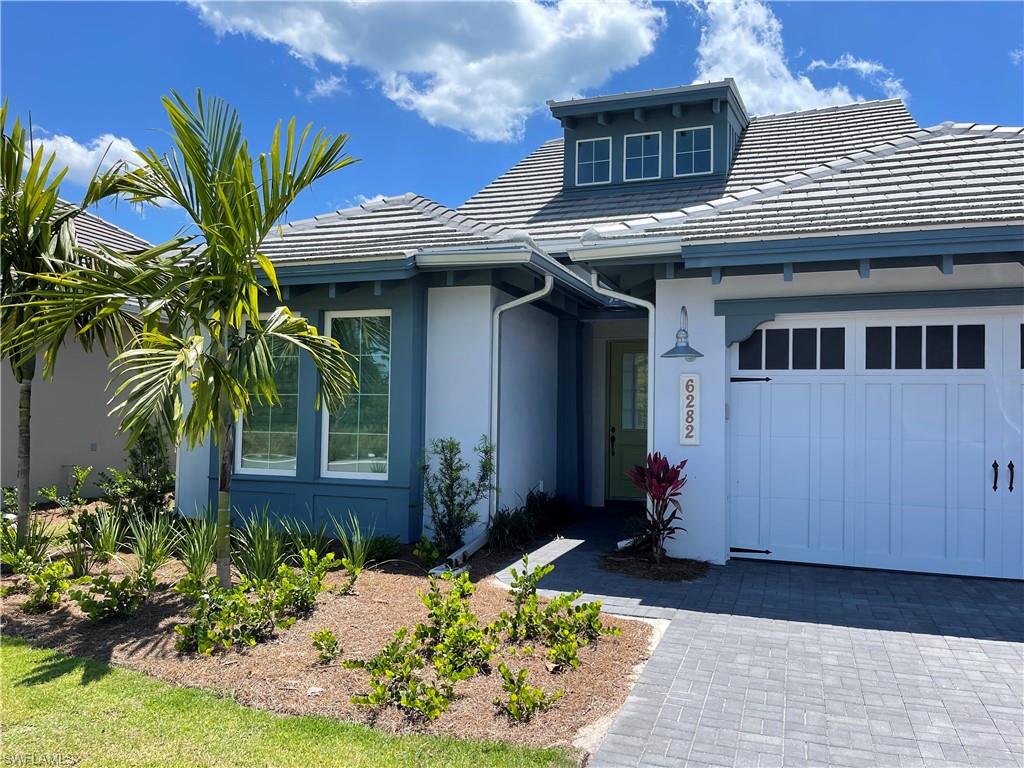6282 Indies Avenue Naples, FL 34113 - Photo 2 of 33 a view of a entryway of the house