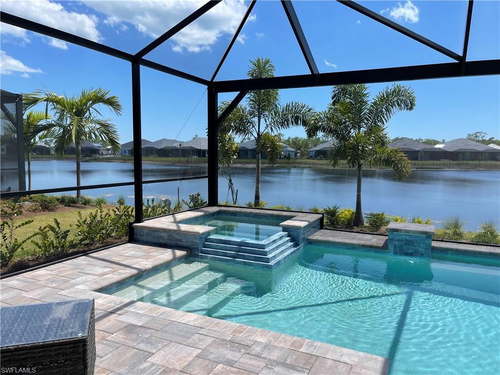 6282 Indies Avenue Naples, FL 34113 - Photo 21 of 33 a view of a backyard with sitting area