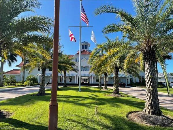 a view of a park with palm trees