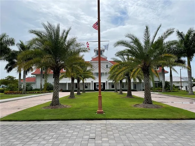 a view of a park with palm trees